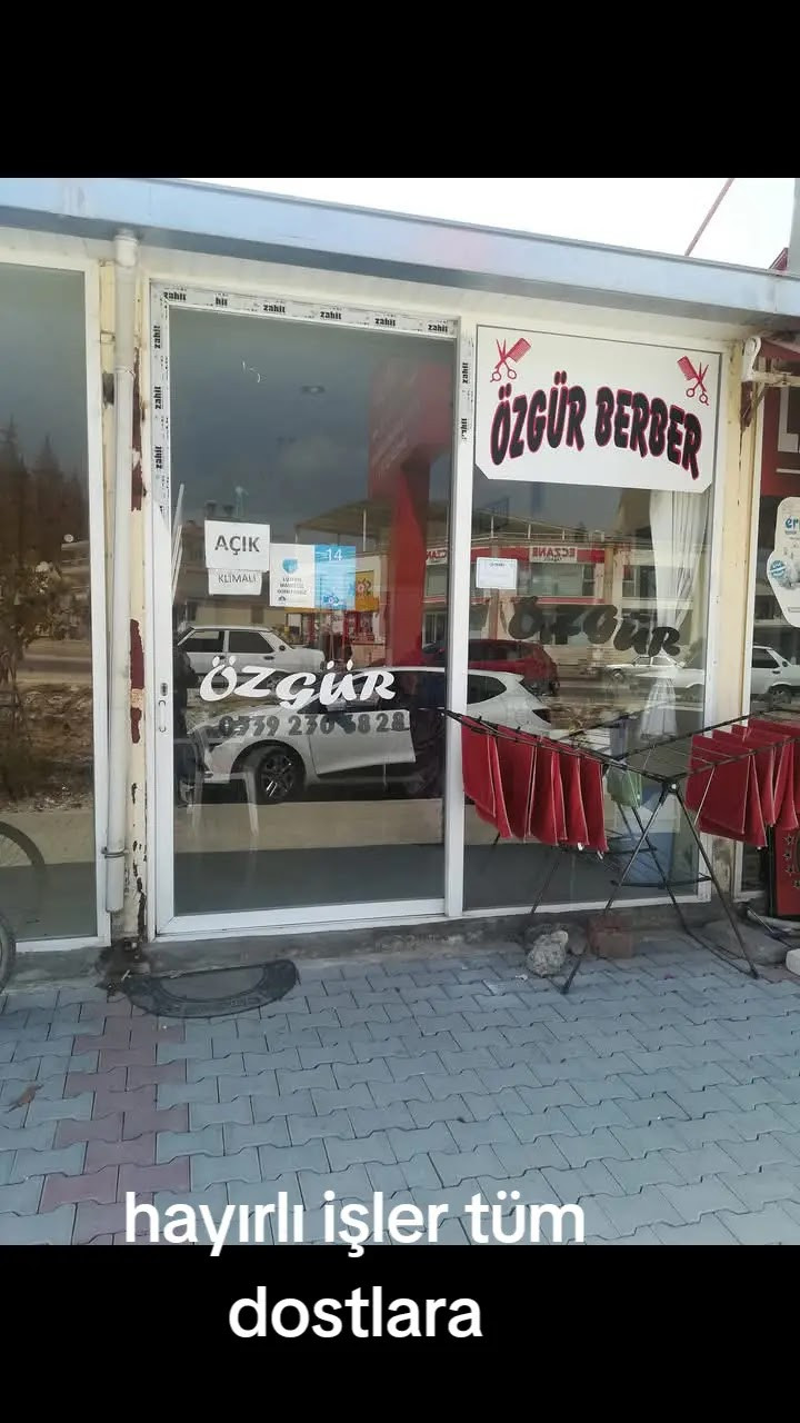 Özgür erkek kuaförü logosu