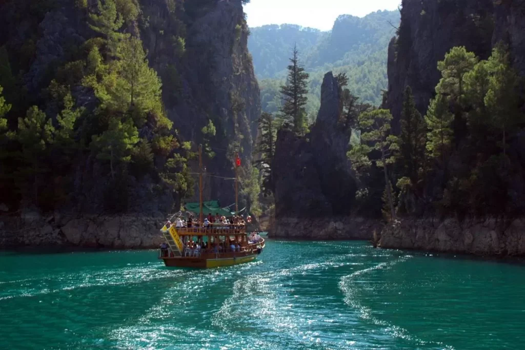 Scenic boat trip on the emerald waters of Green Lake (Oymapınar Dam) in Köprülü Canyon