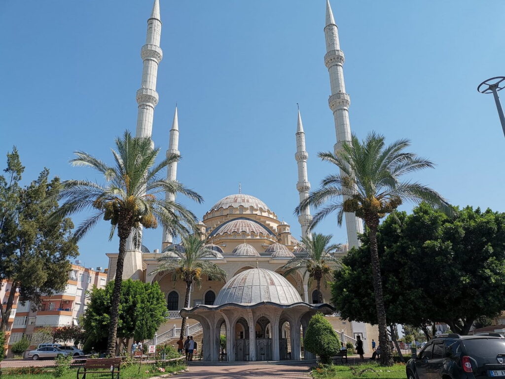 Kulliye Mosque cultural visit on Side Mix Tour showing tourists learning about Turkish Islamic traditions
