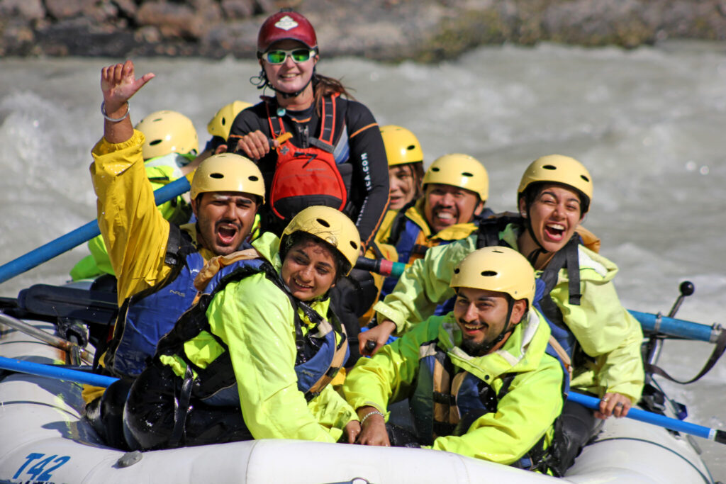Professional rafting instructor giving safety briefing with life jackets and helmets at Köprülü Canyon