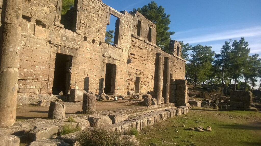 Seleukeia Lyrbe Ancient City ruins exploration on Side Mix Tour showing Roman-era historical site in Taurus Mountains