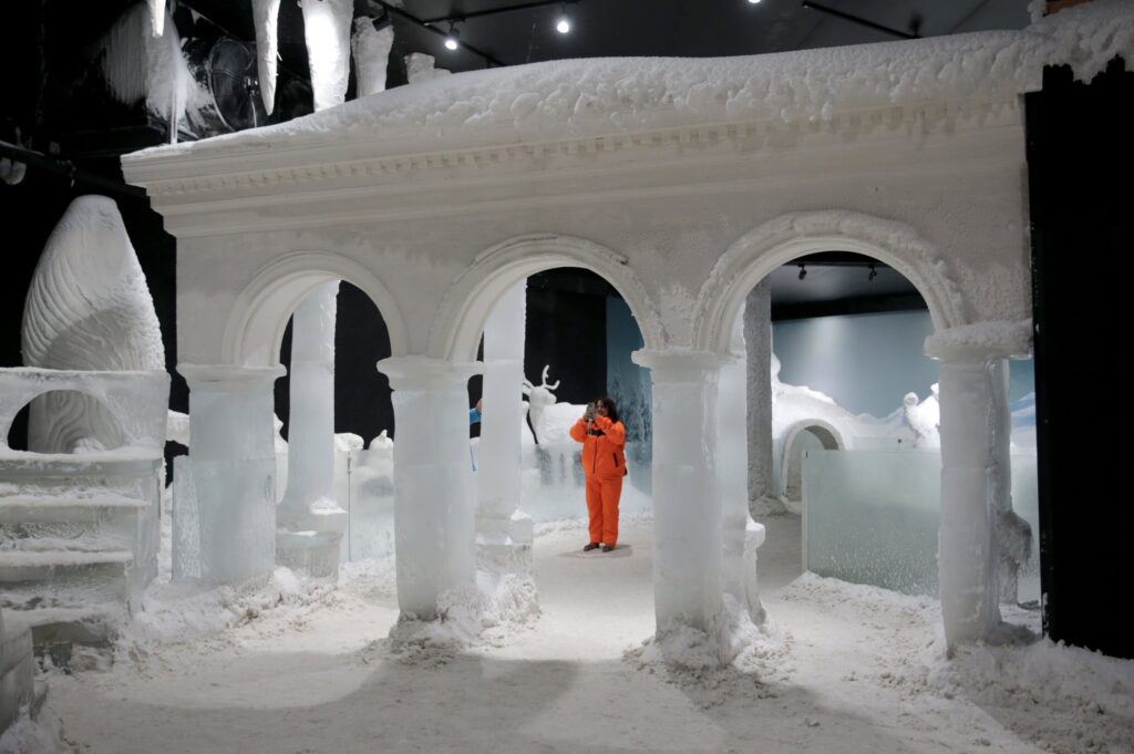 Visitors playing in the snow at Snow World inside Antalya Aquarium complex