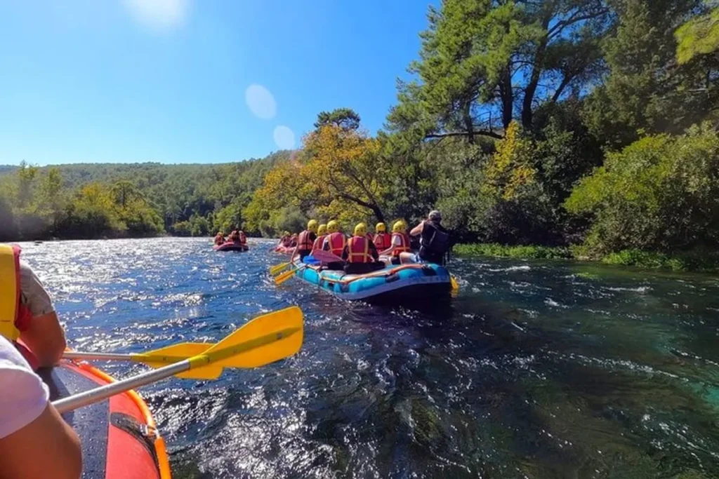 White water rafting splash action on the Köprüçay River during a family rafting tour from Side