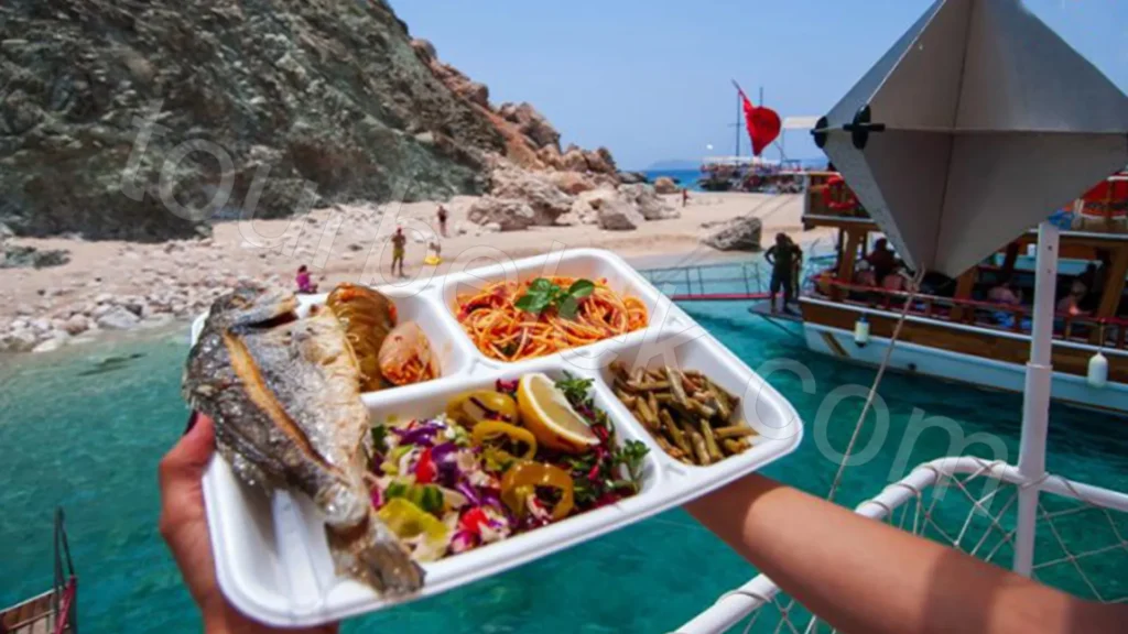 Open buffet lunch with grilled fish or chicken and pasta served on the yacht deck