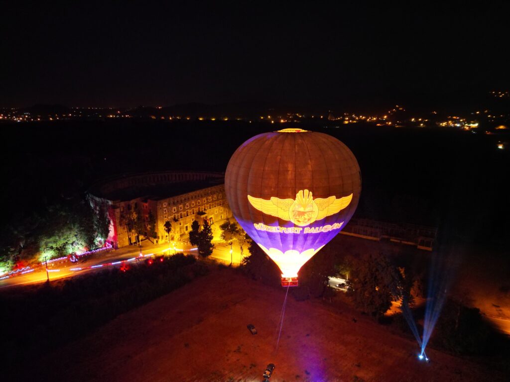 Guests celebrating with champagne after Side hot air balloon flight