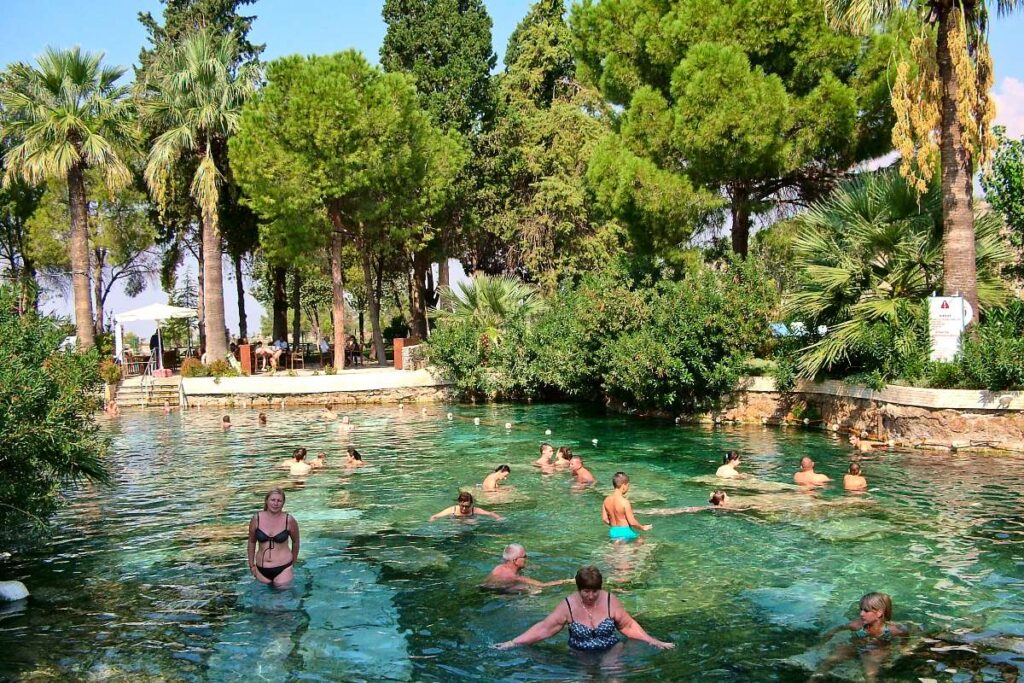 Cleopatra Antique Pool with thermal water and submerged Roman columns at Hierapolis, Pamukkale