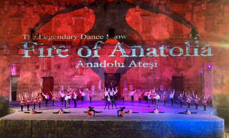 Fire of Anatolia (Anadolu Ateşi) dancers performing a spectacular Turkish dance show on stage at Gloria Aspendos Arena near Side, Antalya