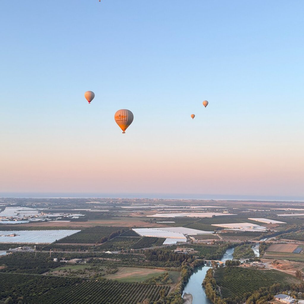 Sunrise balloon flight from Side showing Taurus Mountains and Manavgat River