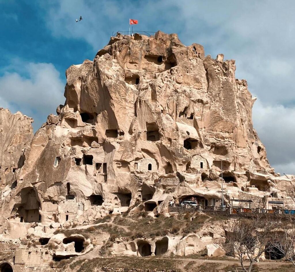 Uçhisar Castle and Göreme Valley panoramic view with cave dwellings in Cappadocia Turkey