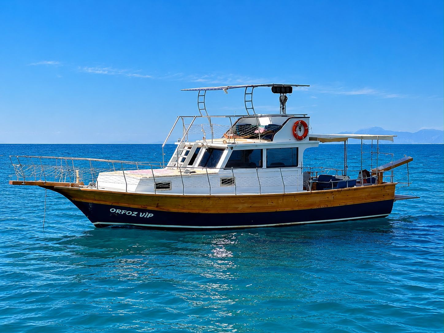 Motor yacht vs gulet comparison Side Turkey - showing modern motor yacht and traditional wooden gulet side by side